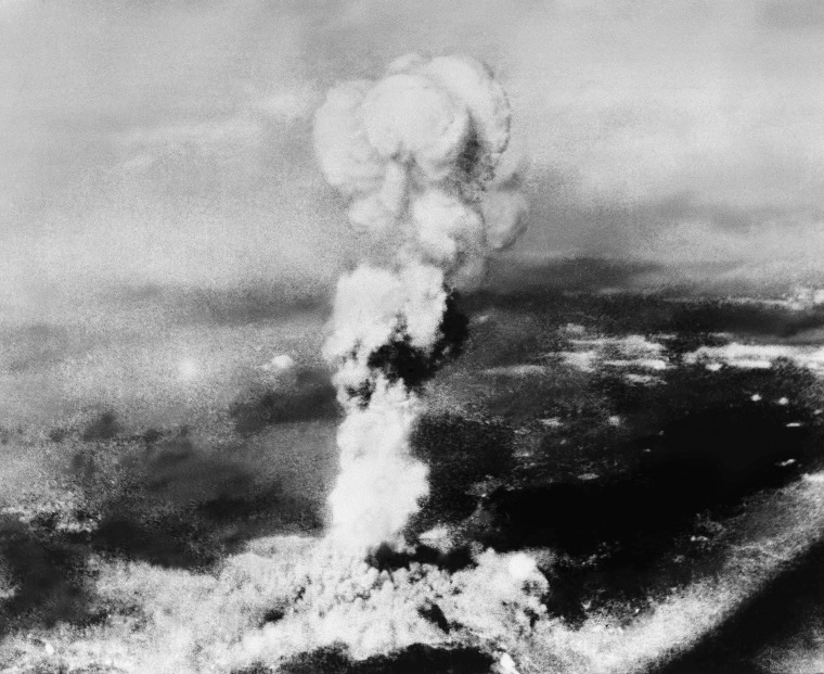 Image: Smoke rises from the explosion of the atomic bomb at Hiroshima, Japan, on Aug. 6, 1945