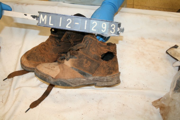 Image: Shoes that belong to a missing person whose body was found along the border, but hasn't been identified.