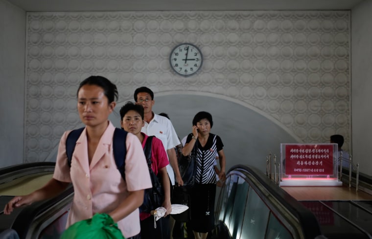 Image: Clock on wall at underground train station in Pyongyang, North Korea, in 2014