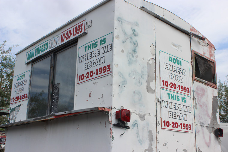 Daniel Contreras' original hot dog cart stands outside one of his restaurants in Tucson, Ariz.