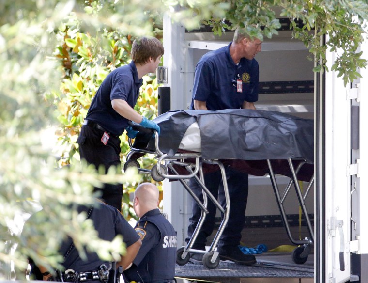 Image: A body is removed from a home