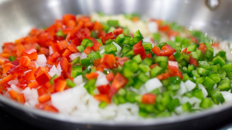 Peppers and onions cooking