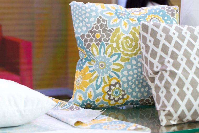 DIY home hacks: layer rugs, origami no-sew pillows, custom lamp shades, new furniture legs, rug wall art