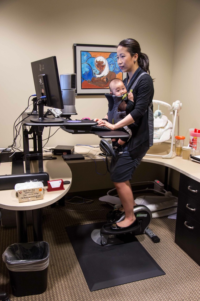 Karen Liu Pang, an employee at United Way of Metropolitan Dallas, with her baby at work.