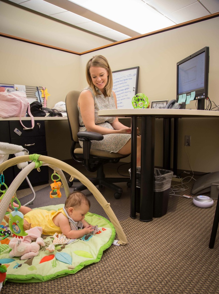 Mom Lindsay Fein, an employee of United Way of Metropolitan Dallas, at work with her newborn.