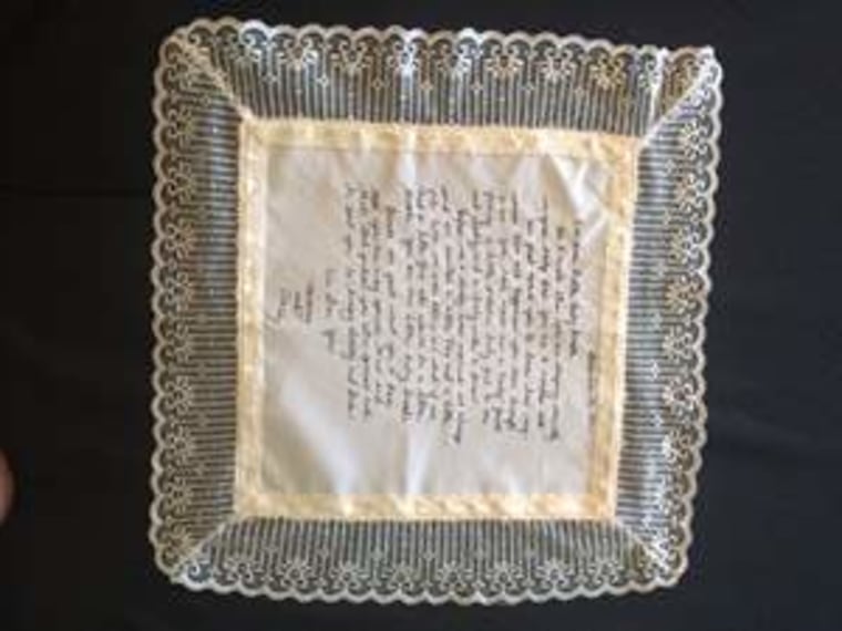 The letter Sherry Blackledge wrote to her adopted daughter 20 years ago was printed on a piece of her own wedding dress.