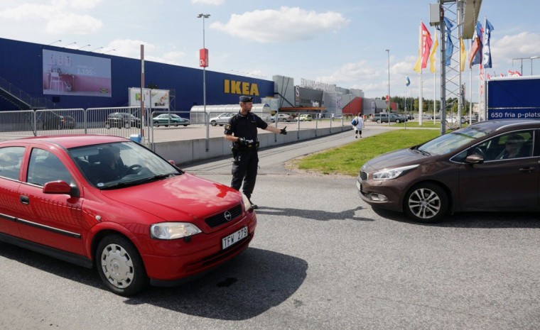 Image: Police outside an IKEA in Sweden where two people were stabbed