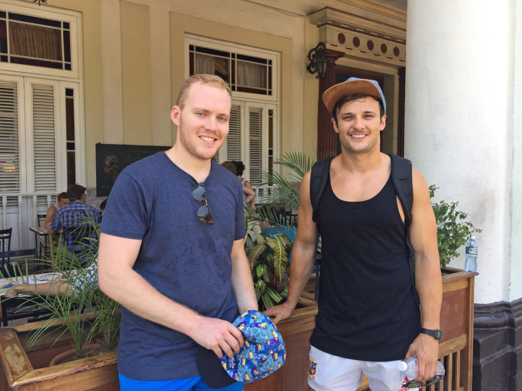 British tourists Joshua Wait and Tom Lovelace are visiting Cuba during the U.S. Embassy's historic flag raising.