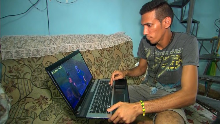 Elio Lopez, 26, has set up a cottage industry in Cuba pirating and sharing copies of international television shows, movies and mobile apps.