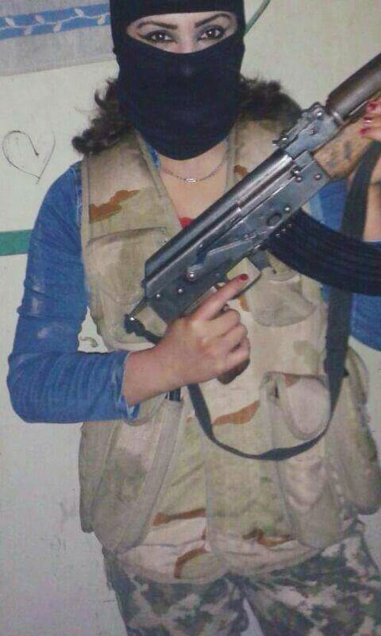 A Syrian woman who defected from ISIS shared this picture of herself when she was a member of ISIS’s morality police.