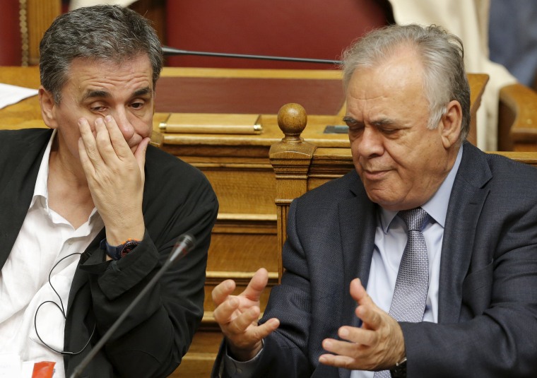 Greek Lawmakers Back Bailout After Marathon Debate 