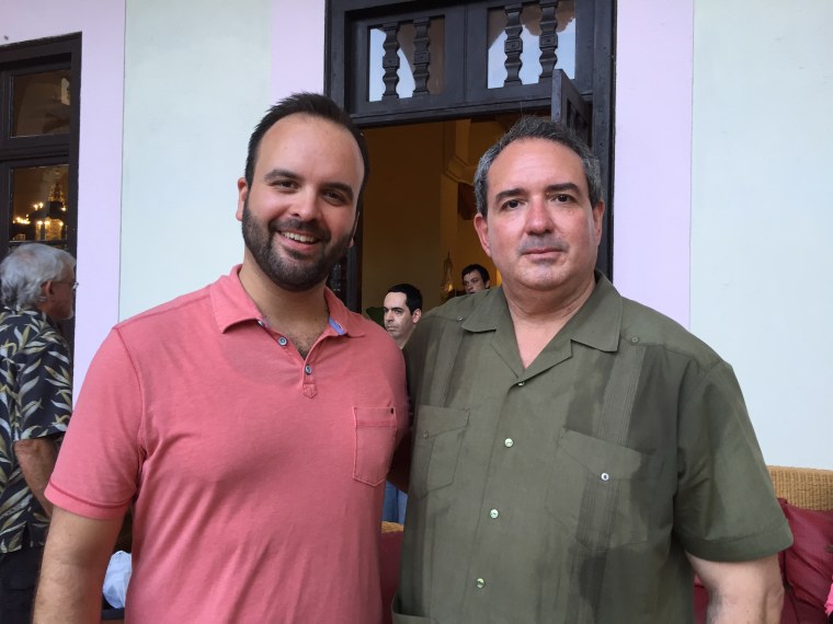 Ric Herrero, from Cuba Now, left, and Hon. Gustavo Arnavat, of CSIS, pose in Havana on Aug. 13, 2015 where they were attending the flag-raising ceremony at the U.S. Embassy.