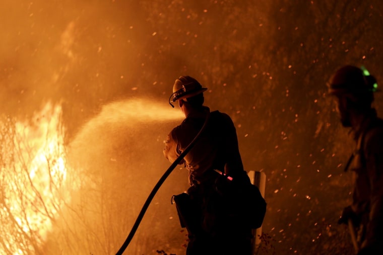 Image: Firefighter battles the so-called "Cabin Fire" in the Angeles National Forest near Los Angeles, California