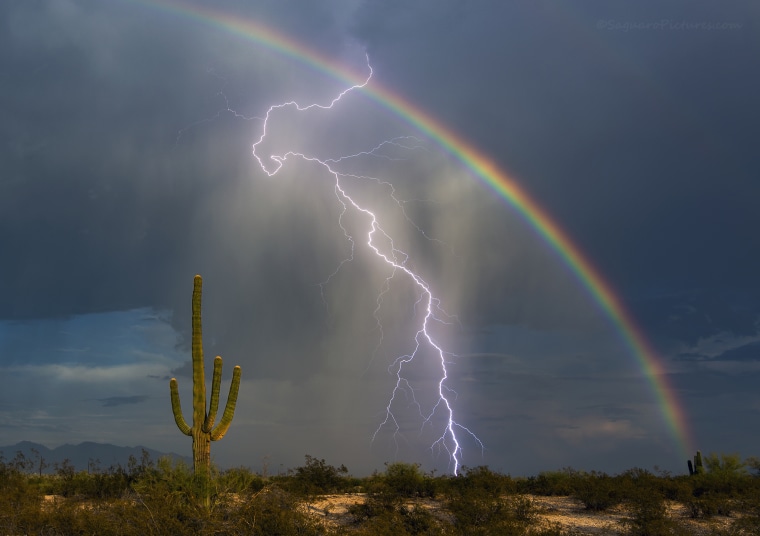 A rainbow and lightning bolt in the same shot.