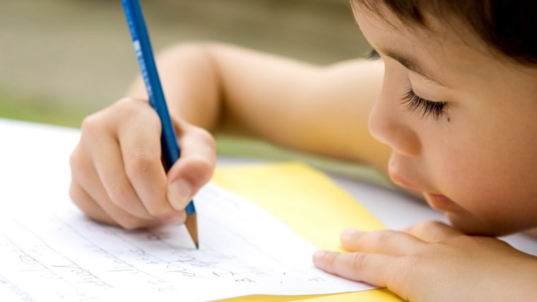 Young boy doing homework