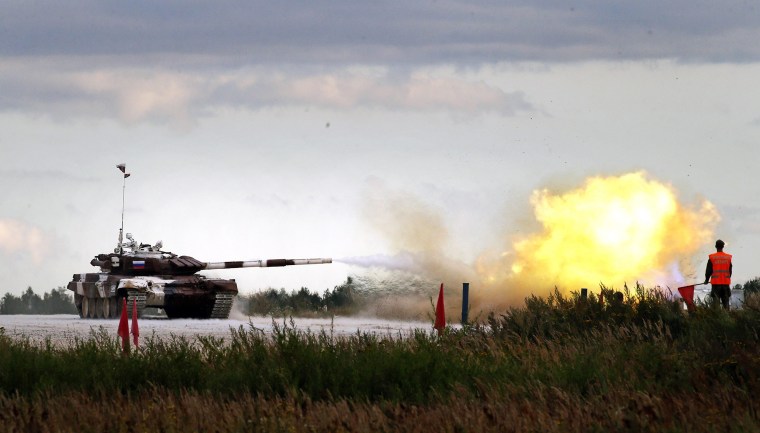 Image: A Russian T-72 B competes during the Tank Biathlon on August 5