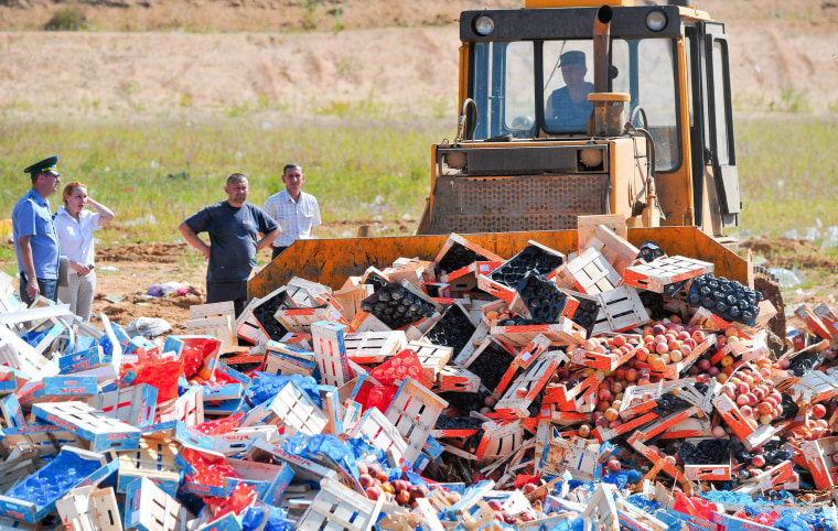 Image: Peaches are crushed by bulldozer