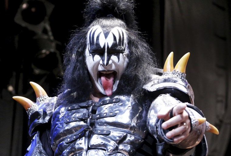 Image: Gene Simmons, a member of the rock band Kiss, poses during an announcement that Kiss and Def Leppard will team up this summer for a 42-city North American tour, at the House of Blues in West Hollywood, California