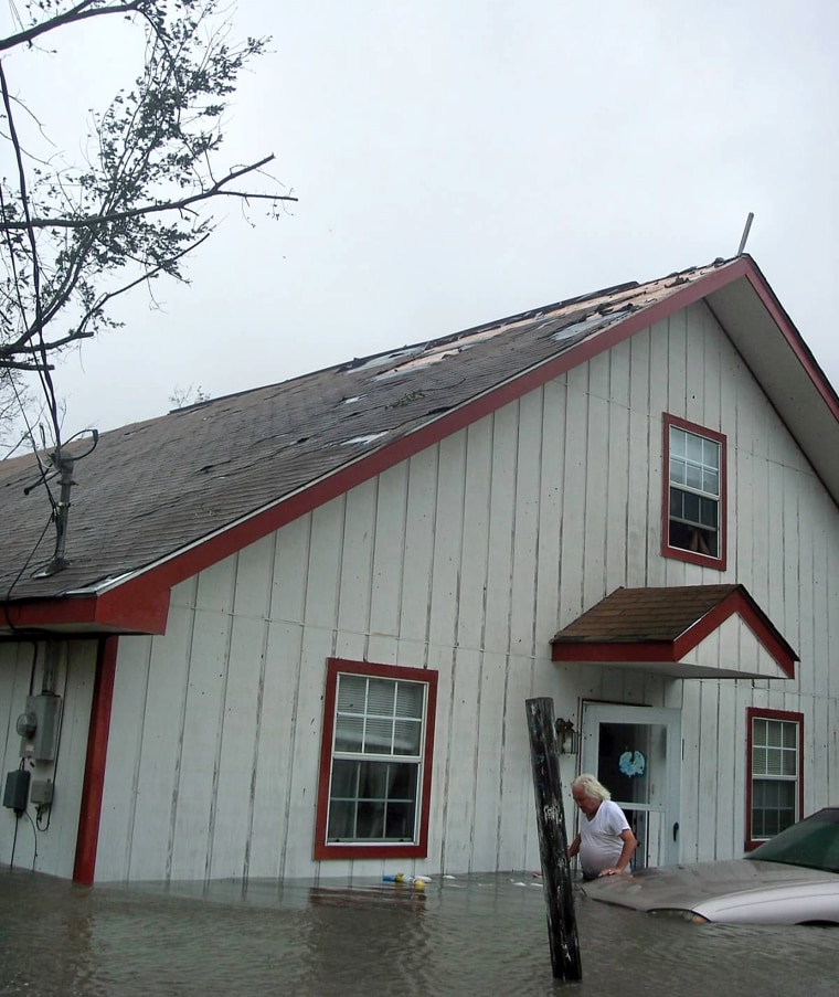 Caption: Louis Smolensky outside of his Waveland, Mississippi, home on Aug. 29, 2005.