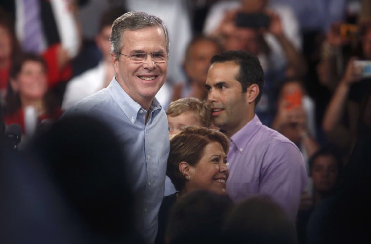 Image: Republican U.S. presidential candidate and former Florida Governor Bush stands with family members after formally announcing campaign for the 2016 Republican presidential nomination at rally in Miami