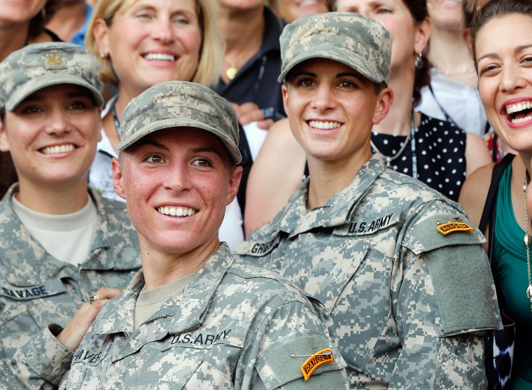 Image: U.S. Army First Lt. Shaye Haver, center, and Capt. Kristen Griest