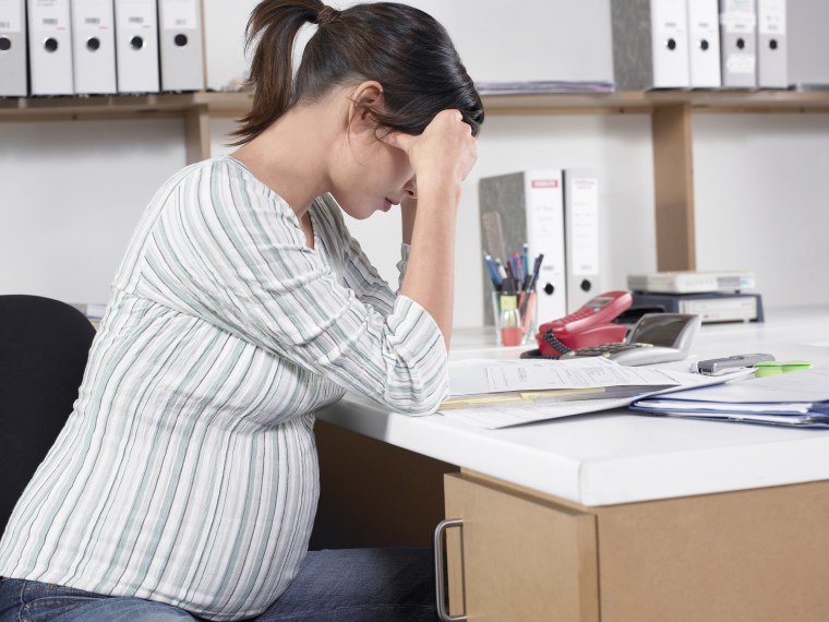 Pregnant woman at work