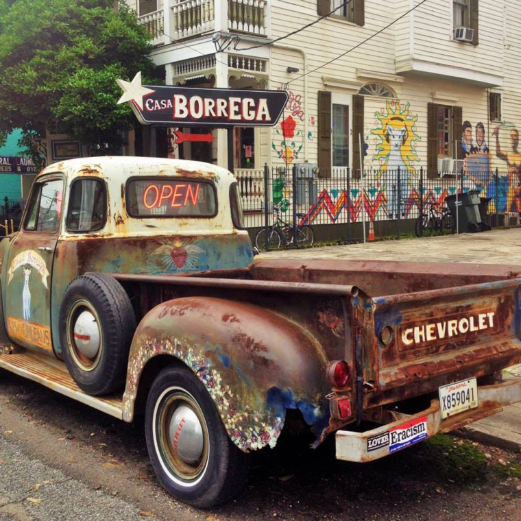 Image: A rusty Chevy truck sits in front of Casa Borrega