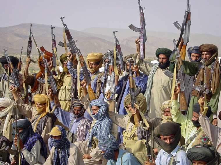 Image: Baloch rebels holding their weapons