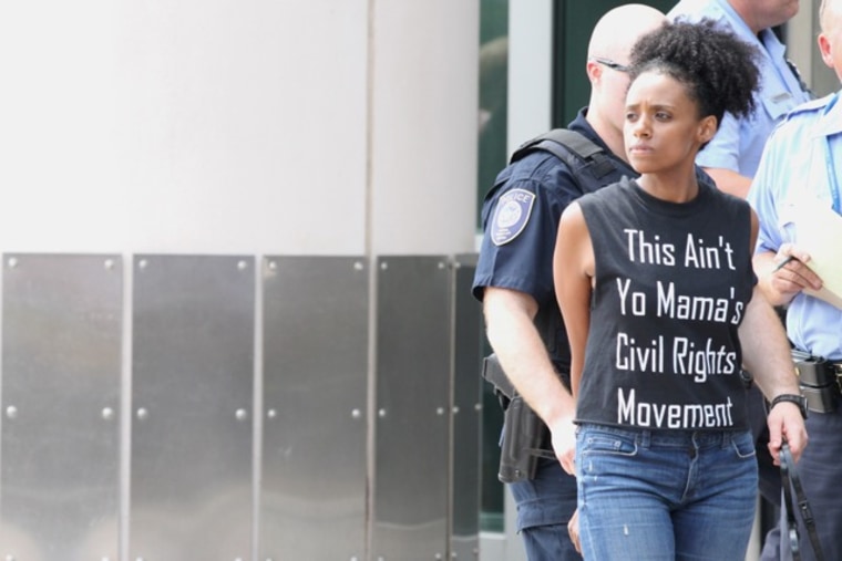 Rahiel Tesfamariam arrested in Ferguson, Missouri wearing a Hands Up United shirt.