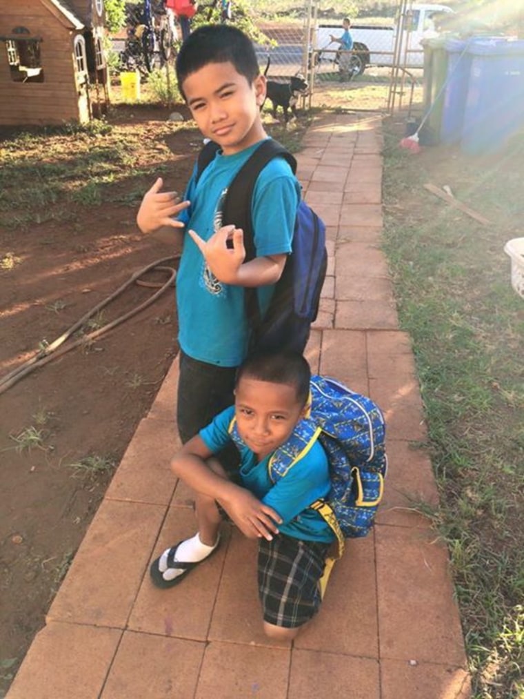 My son and nephew on their first day! 3rd grade and Kindergarten -- ROCK ON BOYZ! Waianae, Hawaii