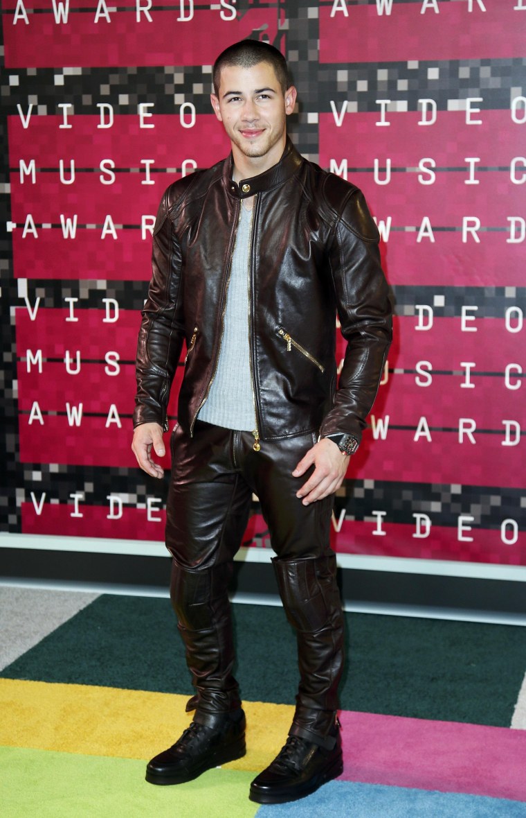 Nick Jonas arrives at the 2015 MTV Video Music Awards in Los Angeles