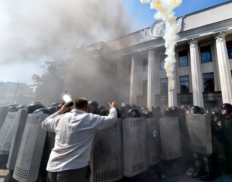 Image: Clashes outside the Ukrainian parliament building on Monday