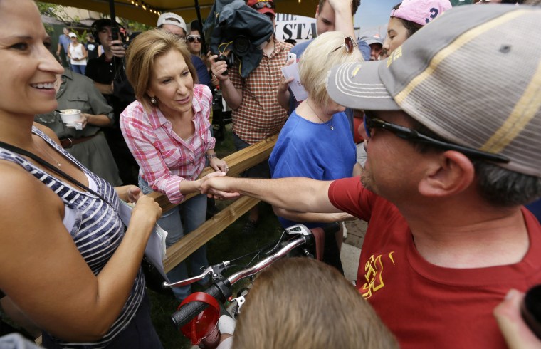 Republican presidential candidate Carly Fiorina greets fairgoers during a visit to the Iowa State Fair, Monday, Aug. 17, 2015, in Des Moines, Iowa. (AP Photo/Charlie Neibergall)