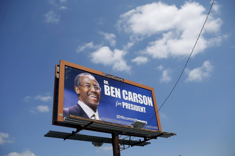 Image: Campaign sign for U.S. Republican presidential candidate and retired Johns Hopkins neurosurgeon Ben Carson is displayed outside the Iowa State Fair in Des Moines