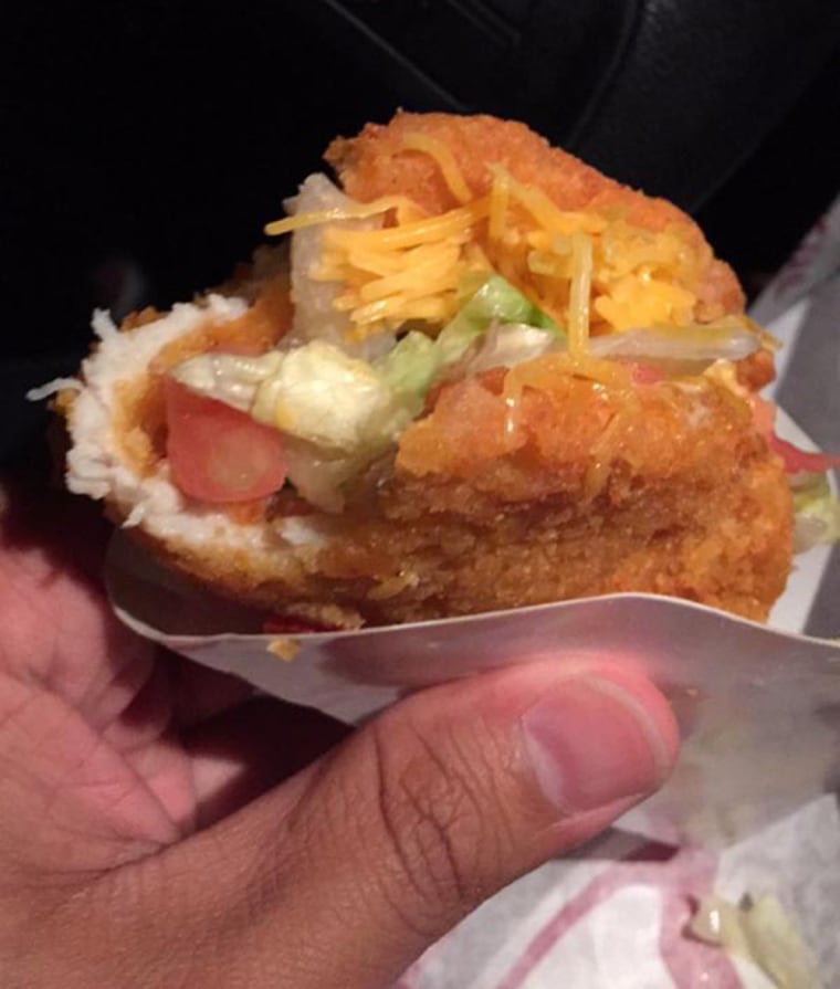 Taco Bell is testing the "Naked Crispy Chicken Taco," which features a shell made of fried chicken. This taco was purchased in Lost Hills, California.