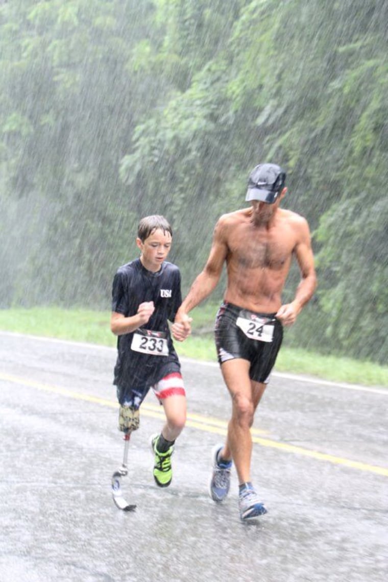 Ben Baltz and his father JC Baltz running in the Freedom Springs Triathlon in July 2013. Note: This is the photo Ben's sister, Rachel, submitted to the Runner's World cover contest.