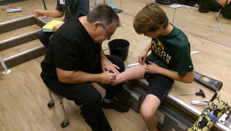 Ben Baltz gets fitted for his most recent prosthetic.