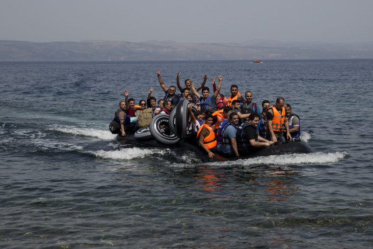 Image: Syrian refugees arrive on Lesbos on Monday
