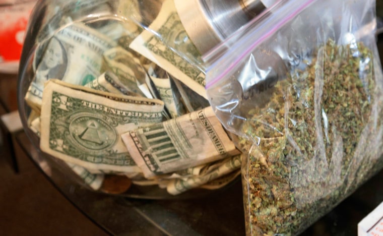 Image: A bag of marijuana being prepared for sale