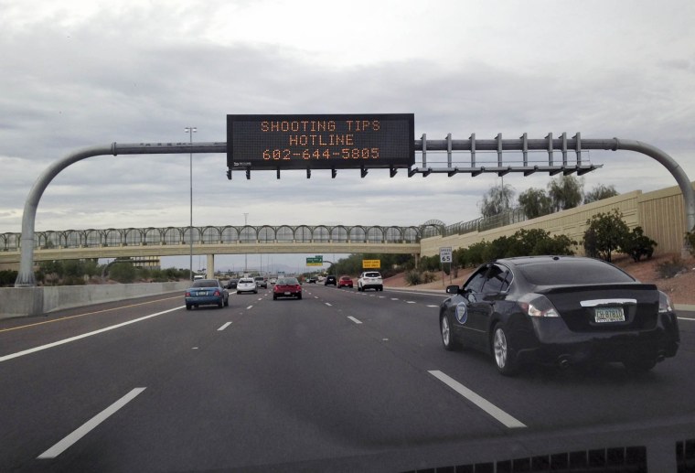 Image: Arizona freeway sign after 10th freeway shooting