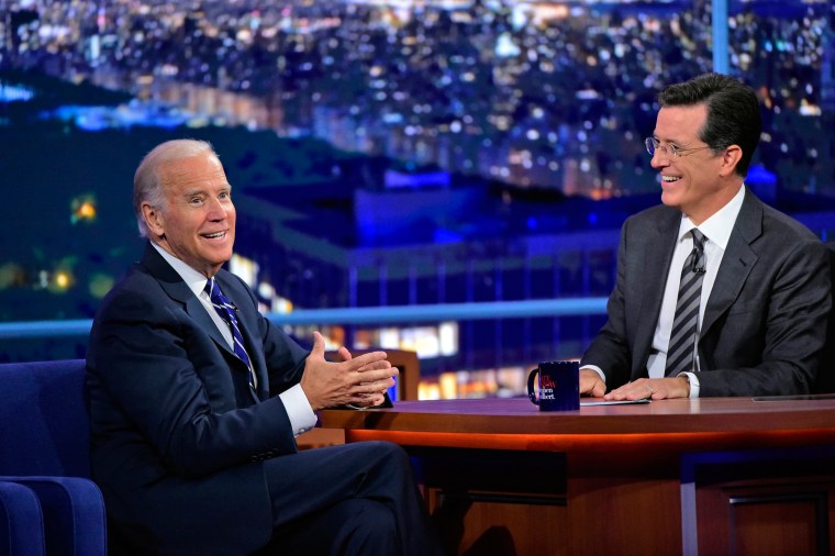 Image: Stephen Colbert talks with Vice President Joe Biden