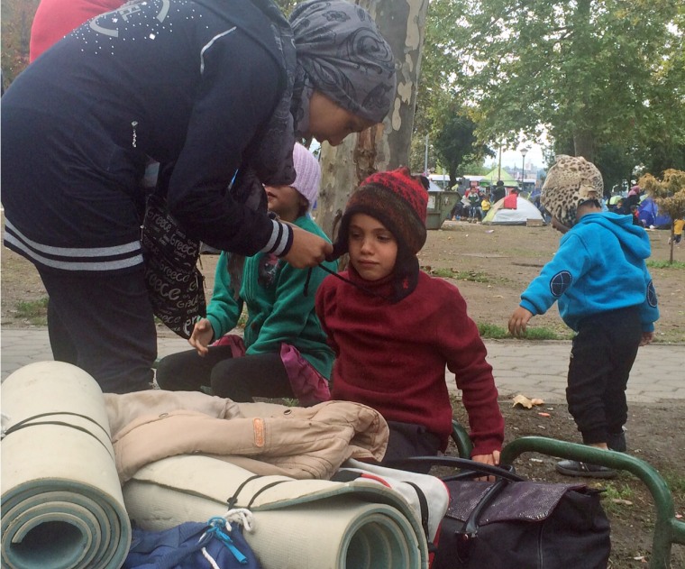 Image: Salma with sons Mohammad and Adam in Belgrade