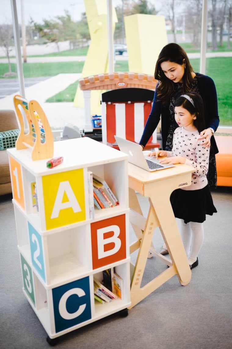 Kids and adults can use the Jigsaw Standup desk so they can stand or sit while working.