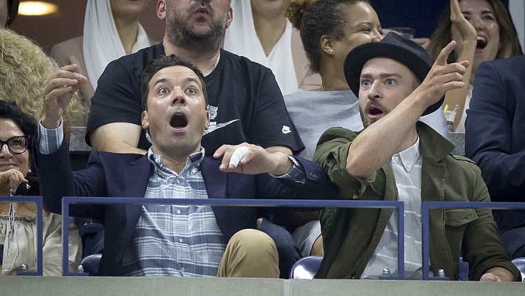 Image: Television personality Fallon and actor and singer Timberlake react to being shown on a video screen as they attend the quarterfinals match between Federer of Switzerland and Gasquet of France at the U.S. Open Championships tennis tournament in New