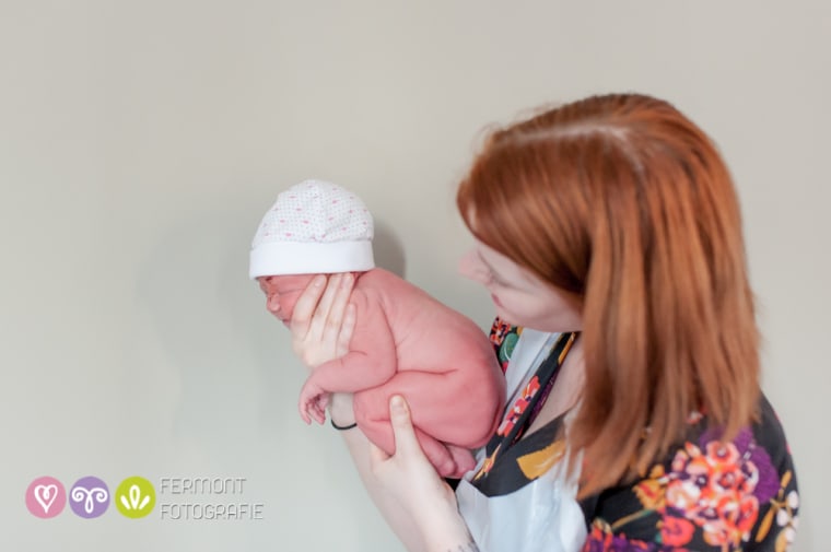 Marry Fermont photographs newborns curled up the way they were in the womb.