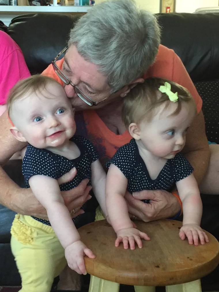 My 1-year-old twin daughters with their Nanny (Liz). They are her only grandchildren at this point and the loves of her life.