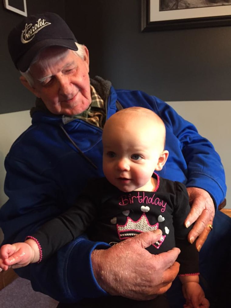This is a photo of my daughter and my Grandpop. It was taken at my daughter's first birthday party. This was the last photo taken of them together. My Grandpop had a stroke on their birthday.