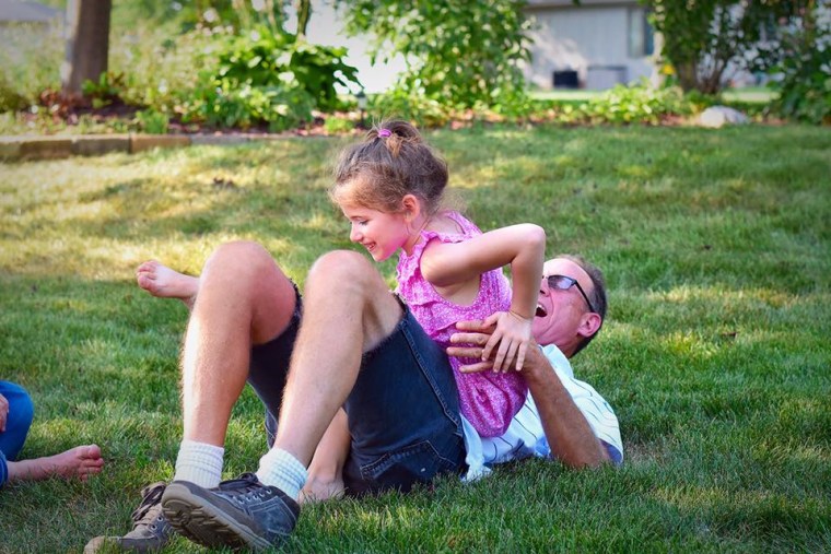 Playing with her Grandpa- or as we call him, Gumpy.