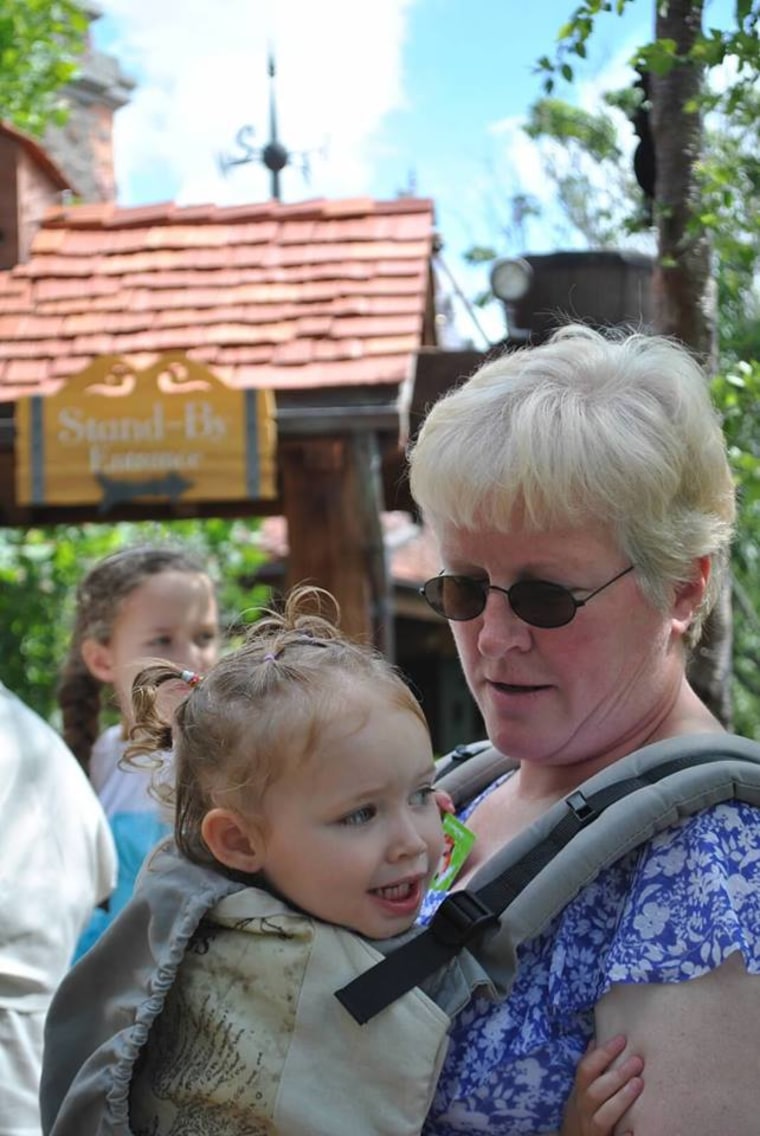 My youngest, 2 year old Kennedy, with her Gammie at Disneyworld