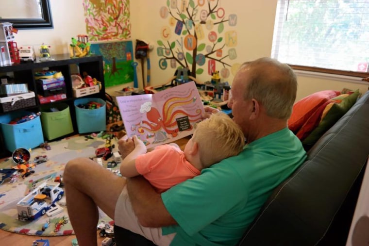 Austin enjoying a book and a snuggle with his Pop-Pop. His Mee-Mee and Pop-Pop are his very best friends. Lucky boy!